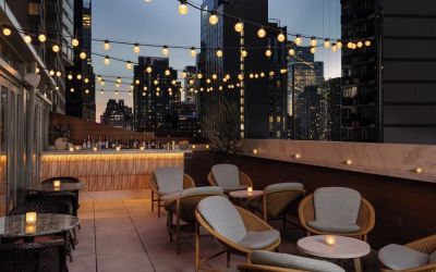Terrace lounge area at Kimpton Theta New York - Times Square.