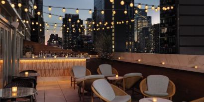 Terrace lounge area at Kimpton Theta New York - Times Square.
