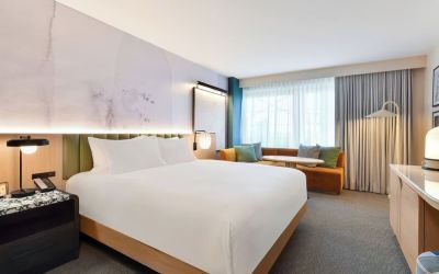 Day use room with king bed at Kimpton Theta New York - Times Square.