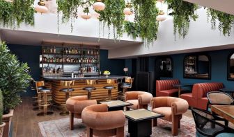 On-site bar with lounge seating at Kimpton Theta New York - Times Square.