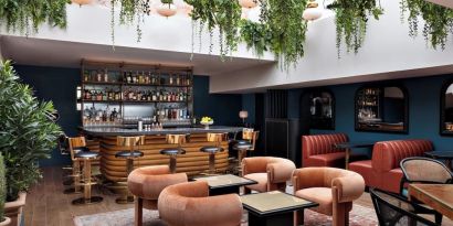 On-site bar with lounge seating at Kimpton Theta New York - Times Square.