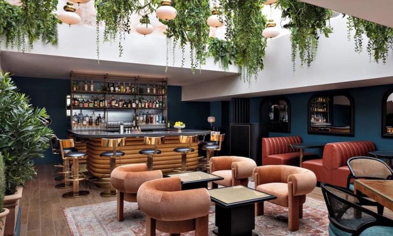 On-site bar with lounge seating at Kimpton Theta New York - Times Square.
