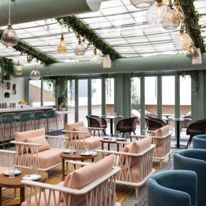 On-site restaurant with comfortable seating at Kimpton Theta New York - Times Square.