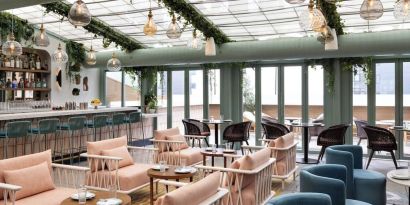 On-site restaurant with comfortable seating at Kimpton Theta New York - Times Square.