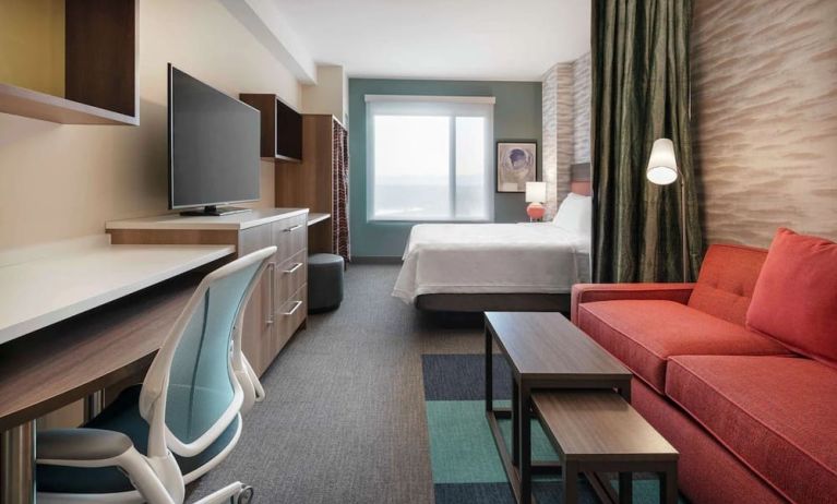Bright and spacious day use room with workspace at 	Home2 Suites By Hilton Denver Downtown Convention Center.