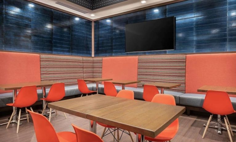 Dining area with comfortable seating at 	Home2 Suites By Hilton Denver Downtown Convention Center.