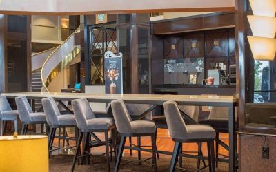 Lobby workspace and coffee shop at Hilton Newark Airport.