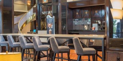 Lobby workspace and coffee shop at Hilton Newark Airport.