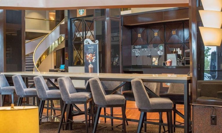 Lobby workspace and coffee shop at Hilton Newark Airport.