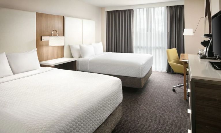 Day use room with TV at Crowne Plaza Dallas Market Ctr - Love Field.