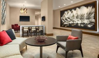 Lounge area and coworking space at Crowne Plaza Dallas Market Ctr - Love Field.