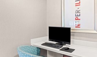 Business center with computer, printer and comfortable seating at Hampton Inn Chicago/Naperville.