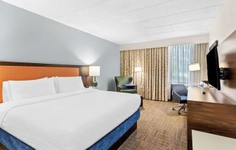 Bright and spacious day use room with work desk at Hampton Inn Chicago/Naperville.