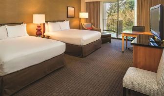 Queen room with TV at DoubleTree By Hilton Seattle Airport.