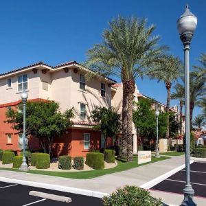 Exterior view and parking area at Sonesta Simply Suites Phoenix Scottsdale.
