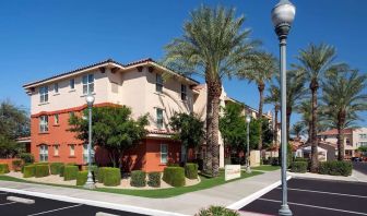 Exterior view and parking area at Sonesta Simply Suites Phoenix Scottsdale.