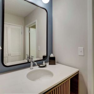 Private guest bathroom with shower and free toiletries at Sonesta Select Scottsdale At Mayo Clinic Campus.