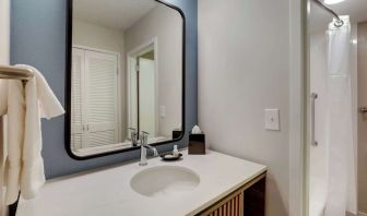 Private guest bathroom with shower and free toiletries at Sonesta Select Scottsdale At Mayo Clinic Campus.
