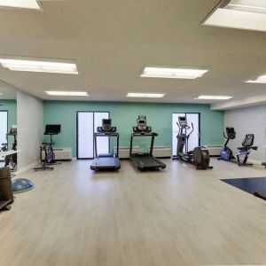 Fully equipped fitness center at Sonesta Select Scottsdale At Mayo Clinic Campus.
