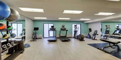 Fully equipped fitness center at Sonesta Select Scottsdale At Mayo Clinic Campus.