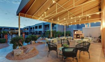 Hotel patio with comfortable seating and fireplace at Sonesta Select Scottsdale At Mayo Clinic Campus.