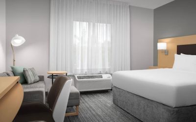 Day use room with sofa and work desk at TownePlace Suites Franklin Cool Springs.