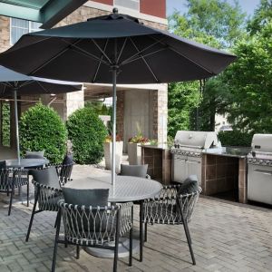 Barbecue grill and picnic area at TownePlace Suites Franklin Cool Springs.