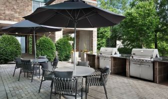 Barbecue grill and picnic area at TownePlace Suites Franklin Cool Springs.