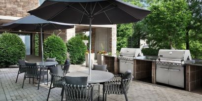 Barbecue grill and picnic area at TownePlace Suites Franklin Cool Springs.