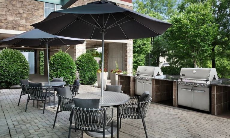 Barbecue grill and picnic area at TownePlace Suites Franklin Cool Springs.