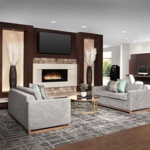 Lobby and coworking lounge at TownePlace Suites Franklin Cool Springs.