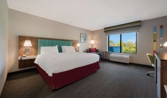Spacious day use room with work desk at Hampton Inn Detroit Southfield.

