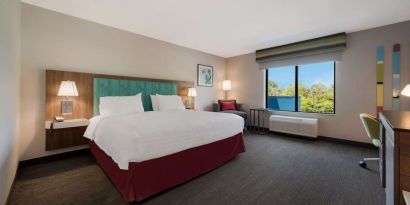 Spacious day use room with work desk at Hampton Inn Detroit Southfield.
