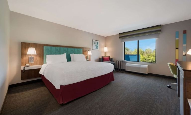 Spacious day use room with work desk at Hampton Inn Detroit Southfield.
