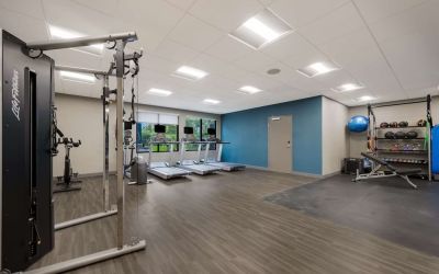 Spacious fitness center at Hampton Inn Detroit Southfield.

