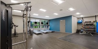 Spacious fitness center at Hampton Inn Detroit Southfield.
