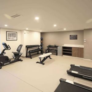 Well equipped fitness center at Sleep Inn Oakbrook Terrace.