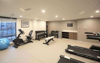 Well equipped fitness center at Sleep Inn Oakbrook Terrace.