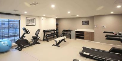 Well equipped fitness center at Sleep Inn Oakbrook Terrace.