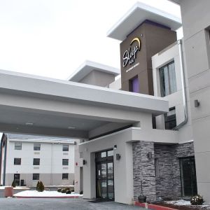 Entrance and parking area at Sleep Inn Oakbrook Terrace.