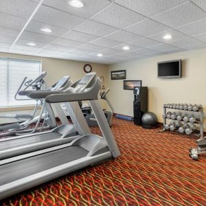 Well equipped fitness center at Holiday Inn Express Chicago - Downers Grove.