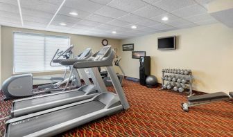 Well equipped fitness center at Holiday Inn Express Chicago - Downers Grove.