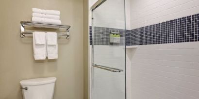 Private gueest bathroom with shower and free toiletries at Staybridge Suites Washington D.C.- Greenbelt.