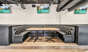 Dining area with comfortable seating at Radisson Hotel Schaumburg.