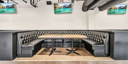 Dining area with comfortable seating at Radisson Hotel Schaumburg.