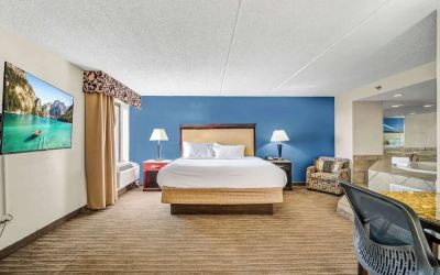 Day use suite with work desk and hot tub at Radisson Hotel Schaumburg.