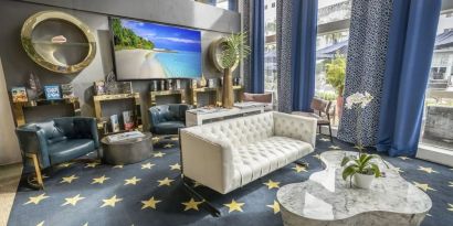 Lobby lounge area and workspace at Catalina Hotel & Beach Club.