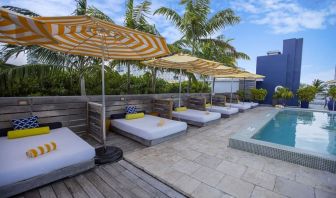 Outdoor pool with lounge beds at Catalina Hotel & Beach Club.