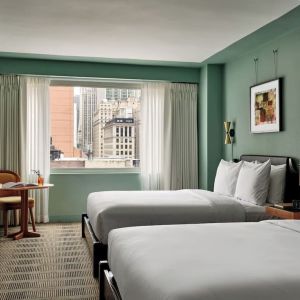 Day use twin room with workdesk at Romer Hell's Kitchen.