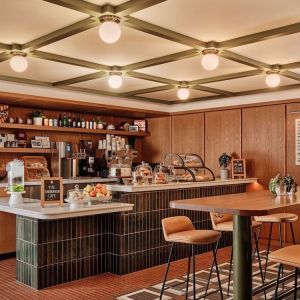 Hotel's coffee shop perfect for coworking at Romer Hell's Kitchen.